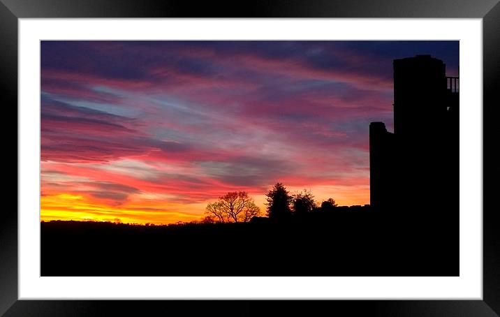 A sunset at Kenilworth Castle Framed Mounted Print by John Evans