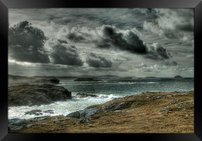 Storm Clouds around Lewis. Framed Print by Robert Murray