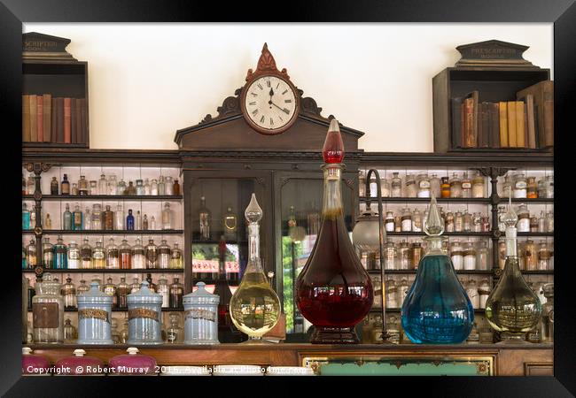 At The Apothecary Framed Print by Robert Murray