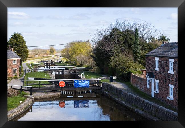 Locks on the Rufford branch of the Leeds Liverpool canal Framed Print by Jason Wells