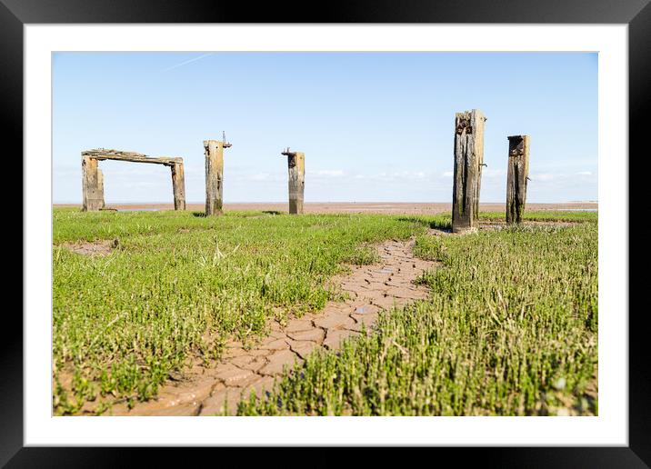 Remains of the jetty at Snettisham beach Framed Mounted Print by Jason Wells