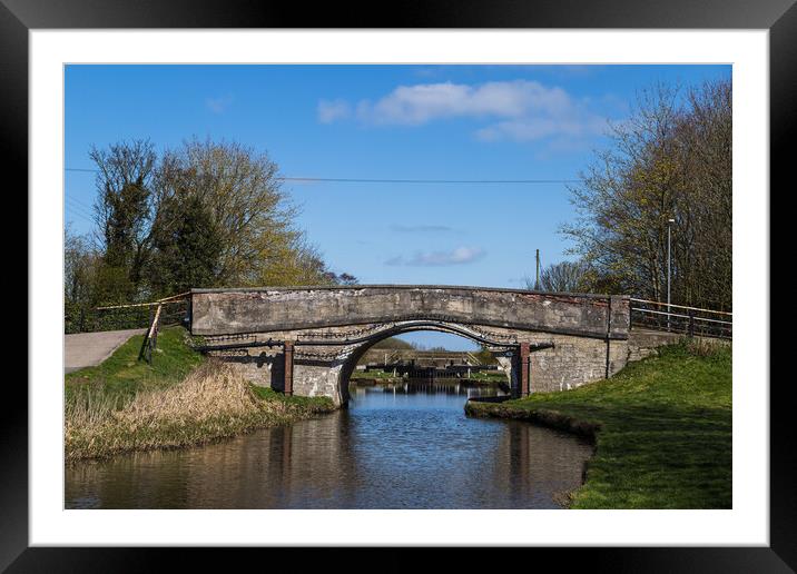 Canal lock seen through a bridge  Framed Mounted Print by Jason Wells