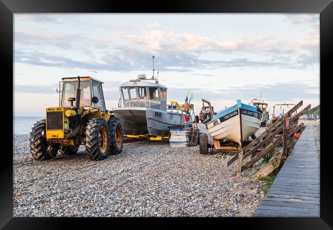 Tractors and fishing boats on Cromer beach Framed Print by Jason Wells