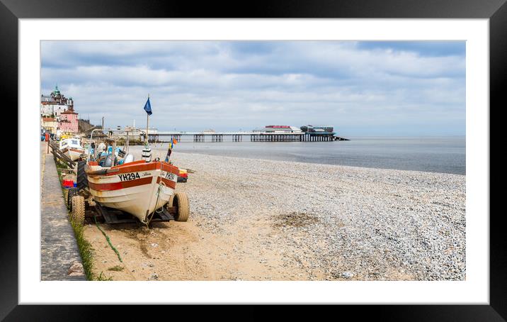 Tractors line the edge of Cromer beach Framed Mounted Print by Jason Wells