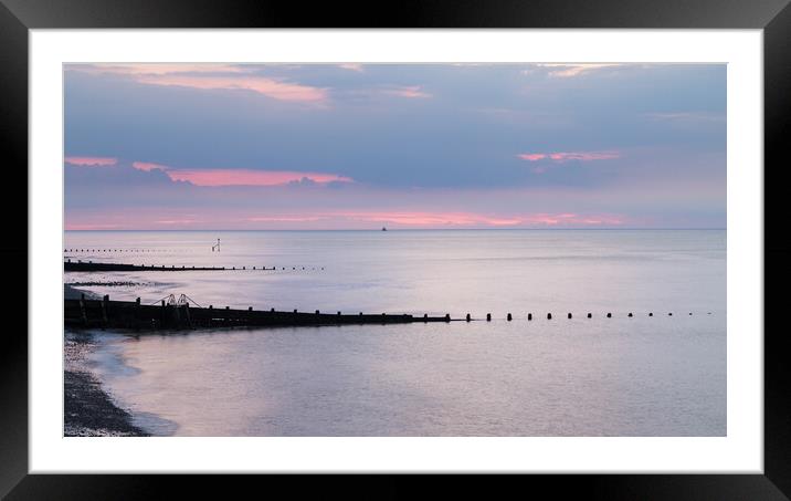 Groynes at Cromer at sunset Framed Mounted Print by Jason Wells