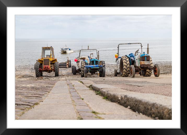Tractors on Cromer slipway Framed Mounted Print by Jason Wells