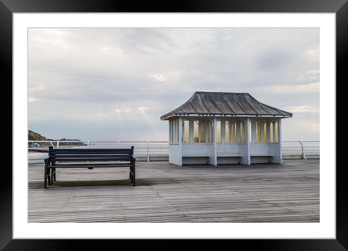 Bench and shelter on Cromer Pier Framed Mounted Print by Jason Wells