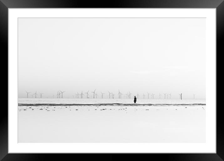 Silhouette of an Iron Man in black and white Framed Mounted Print by Jason Wells