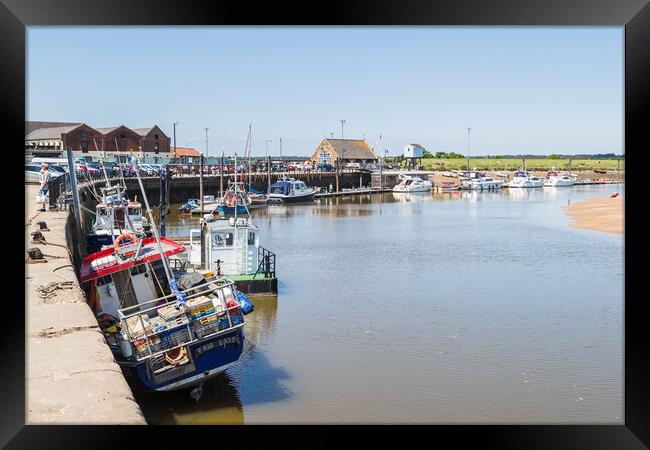 Fishing boats line the quay at Wells next the Sea Framed Print by Jason Wells