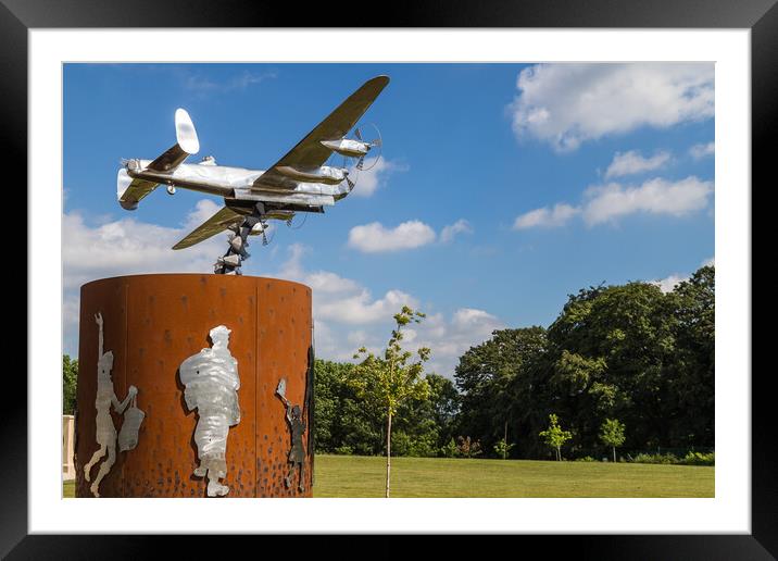 Lancaster bomber statue Framed Mounted Print by Jason Wells