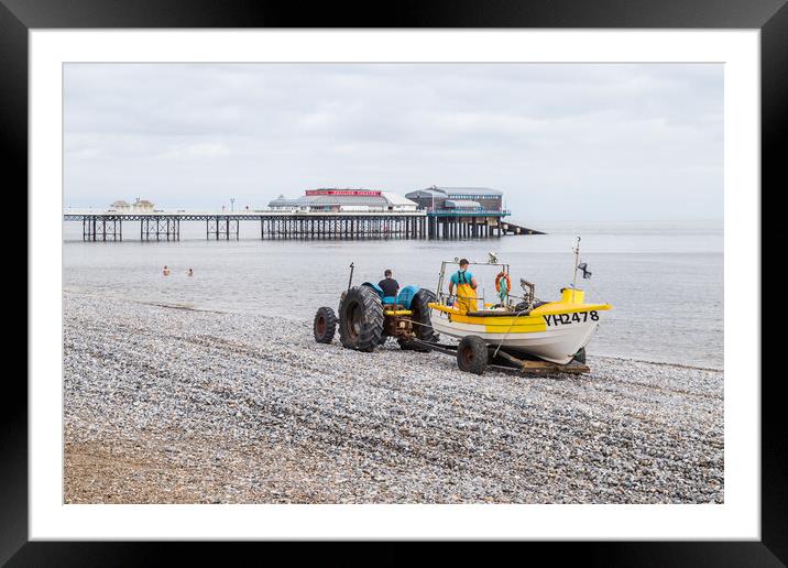 Fishing boat being recovered at Cromer Framed Mounted Print by Jason Wells
