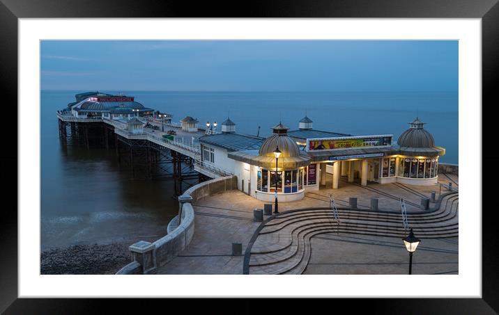 Day turns to night at Cromer pier Framed Mounted Print by Jason Wells