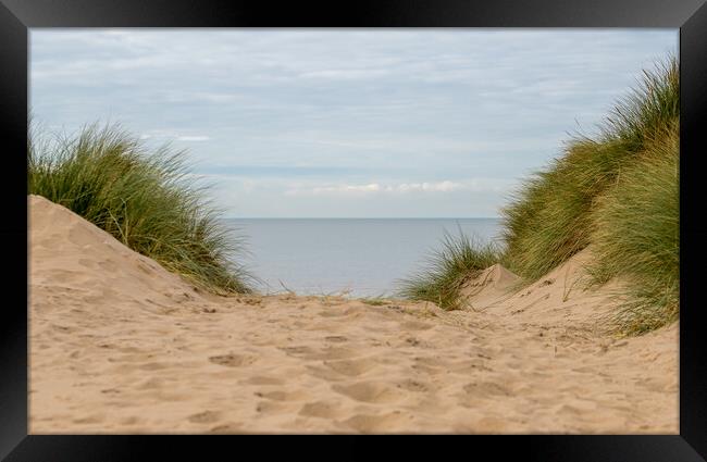 Irish Sea from the top of a sand dune Framed Print by Jason Wells