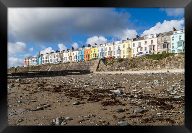 Colourful houses look down on Criccieth beach Framed Print by Jason Wells