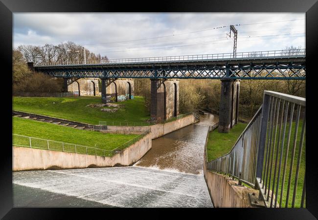 Water flowing down Carr Mill Dam Framed Print by Jason Wells