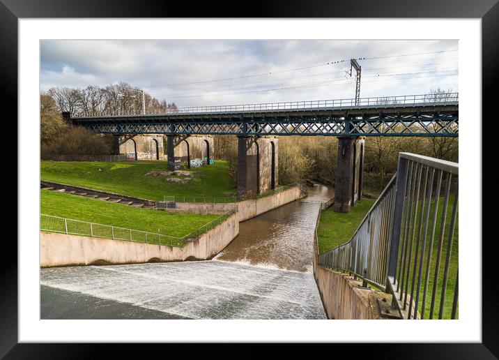 Water flowing down Carr Mill Dam Framed Mounted Print by Jason Wells