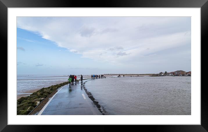 Families blowing out the cobwebs at West Kirby Framed Mounted Print by Jason Wells