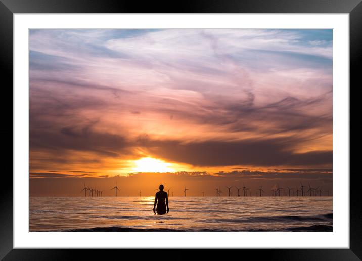 Iron Man watching the sunset Framed Mounted Print by Jason Wells