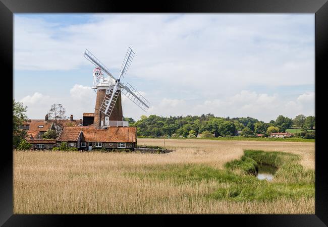 Cley Windmill behind the wetlands Framed Print by Jason Wells