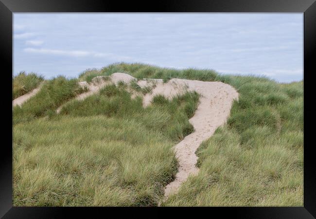 Foot prints over Formby sand dunes Framed Print by Jason Wells