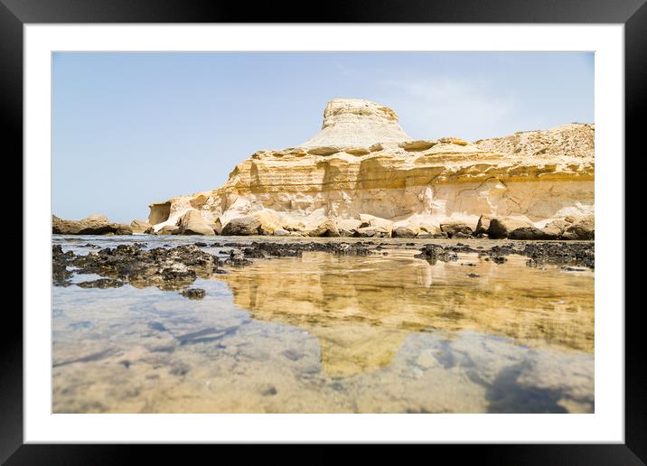 Xwejni rock formation reflecting Framed Mounted Print by Jason Wells