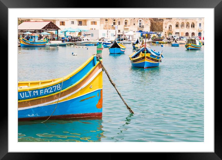 Luzzu boats in Marsaxlokk harbour Framed Mounted Print by Jason Wells
