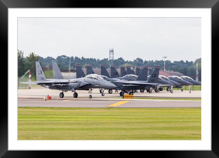 F-15E Strike Eagles prepare to depart Framed Mounted Print by Jason Wells