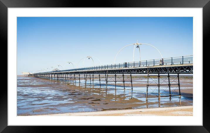 Southport Pier reflecting in pools of water Framed Mounted Print by Jason Wells