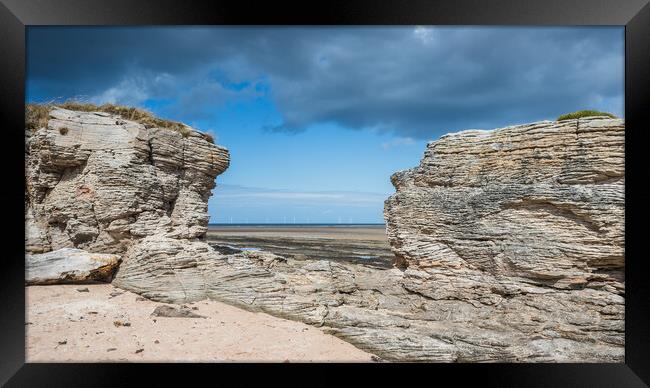 Rock window formation at Hilbre Island Framed Print by Jason Wells