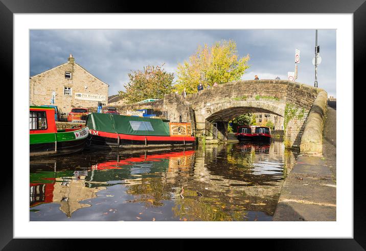 Tourists walking over a bridge in Skipton Framed Mounted Print by Jason Wells