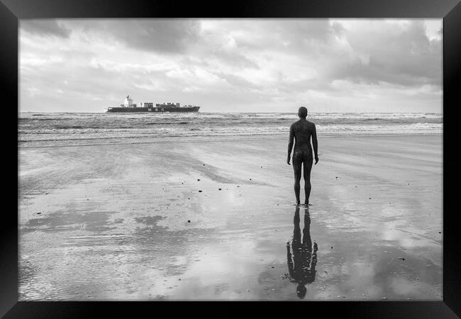 Iron Man watching a container ship passing by Framed Print by Jason Wells