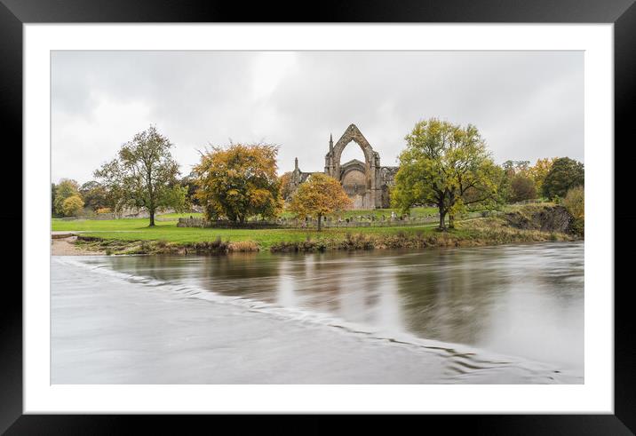 Bolton Abbey over submerged stepping stones Framed Mounted Print by Jason Wells