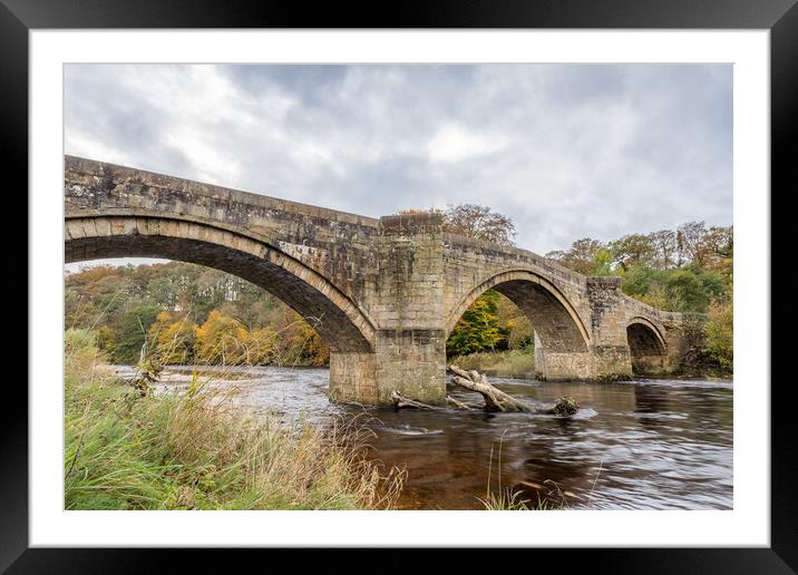 Water flowing under Barden Bridge Framed Mounted Print by Jason Wells