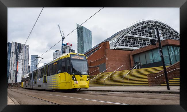 Yellow tram passing the Manchester Central Convention Complex Framed Print by Jason Wells