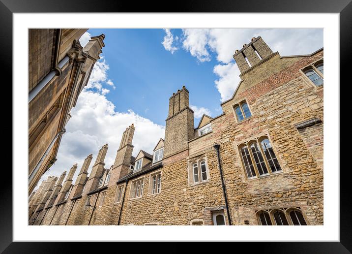 Chimneys lit up in the sunlight on Trinity Lane Framed Mounted Print by Jason Wells