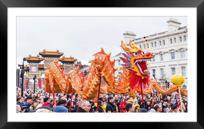 Dragon dance in Liverpool Framed Mounted Print by Jason Wells