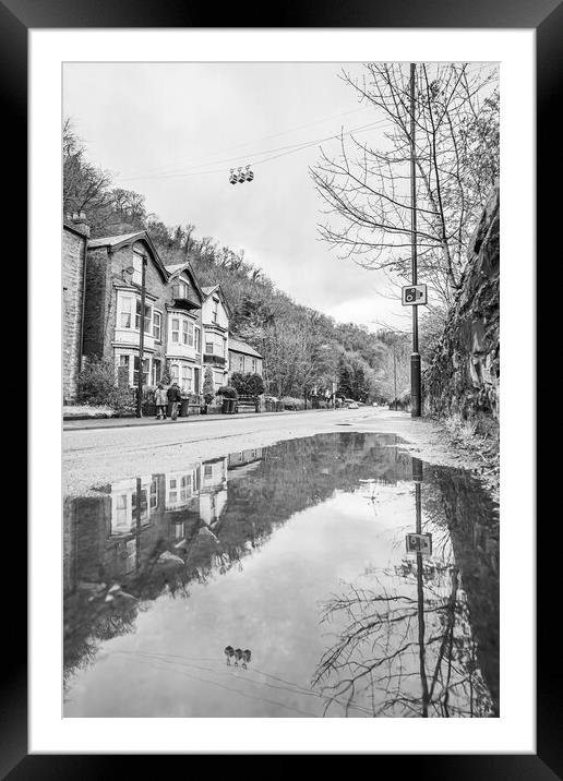 Cable cars reflecting in a puddle Framed Mounted Print by Jason Wells