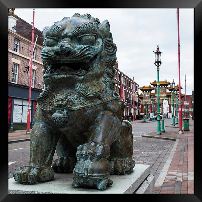 Close-up of a lion statue at Chinatown Framed Print by Jason Wells