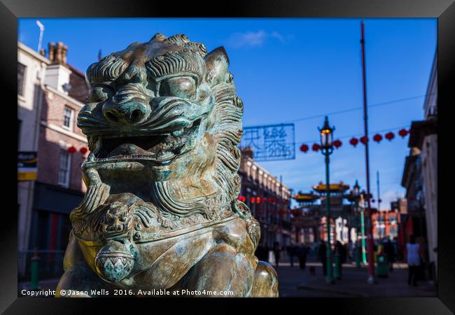 Lion statue at Liverpool's Chinatown Framed Print by Jason Wells