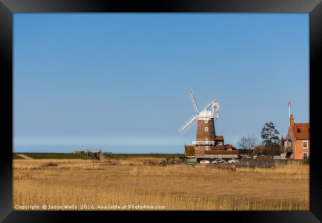 Cley Windmill next to the Salt marshes Framed Print by Jason Wells