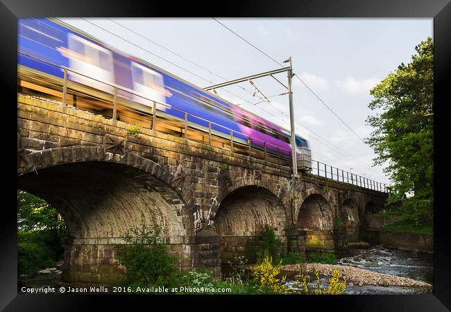Transpennine Express train over the arches Framed Print by Jason Wells