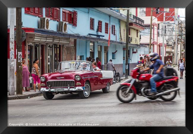 Tourists travel through Havana Framed Print by Jason Wells
