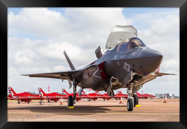 F-35 Lightning II in front of the Red Arrows Framed Print by Jason Wells
