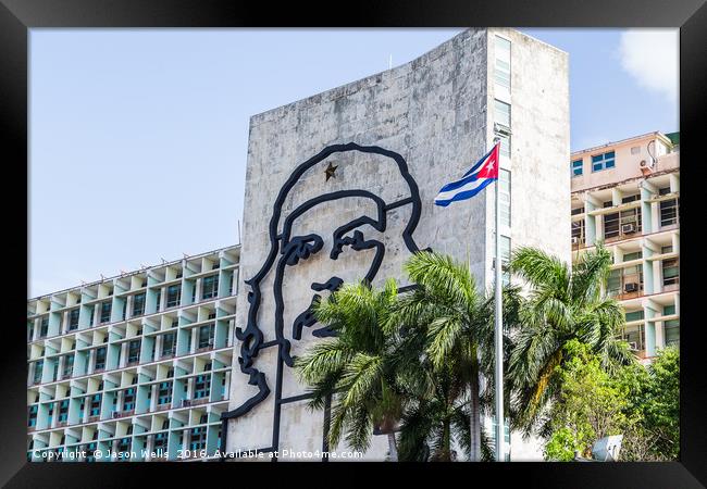Che Guevara next to the Cuban flag Framed Print by Jason Wells
