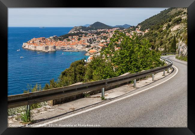 Meandering coastal road towards Dubrovnik Framed Print by Jason Wells