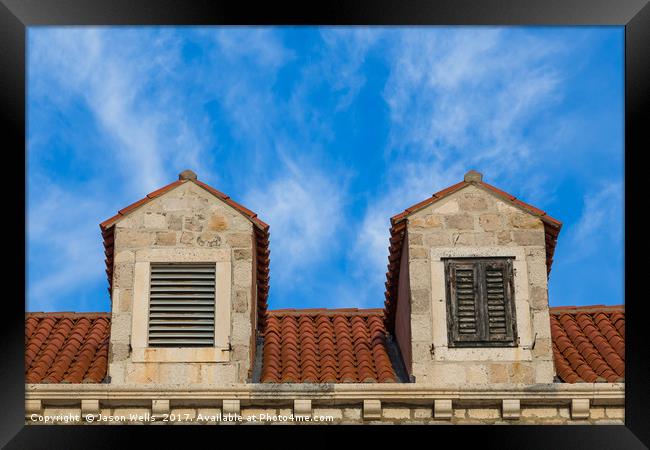 Looking upward at the Dubrovnik architecture Framed Print by Jason Wells