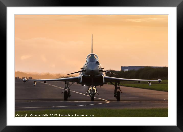 RAF Typhoon taxis out at sunset Framed Mounted Print by Jason Wells