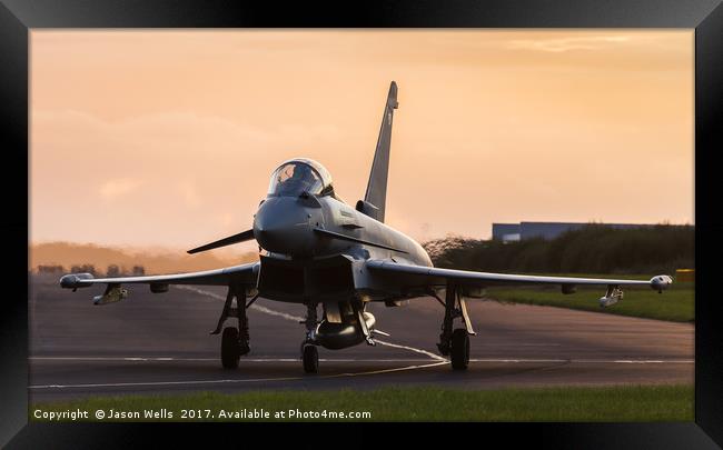 Backlit Typhoon taxis out for takeoff Framed Print by Jason Wells