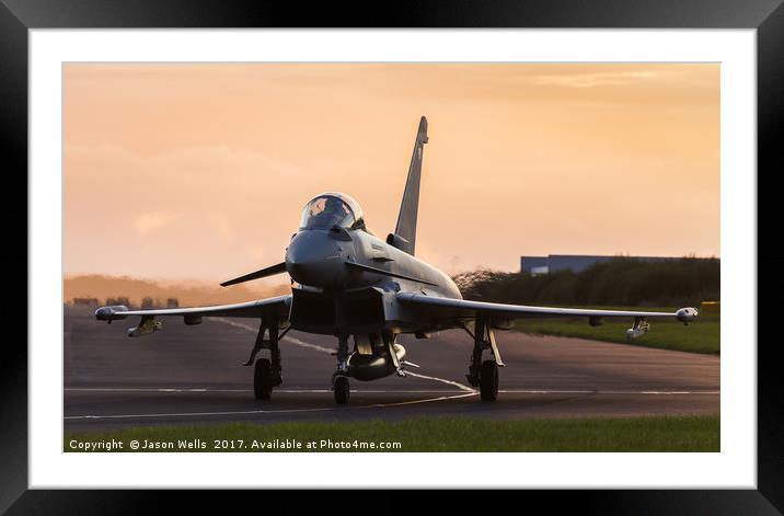 Backlit Typhoon taxis out for takeoff Framed Mounted Print by Jason Wells