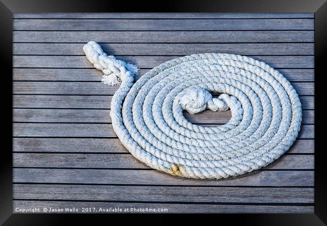Rope neatly left on a boat Framed Print by Jason Wells